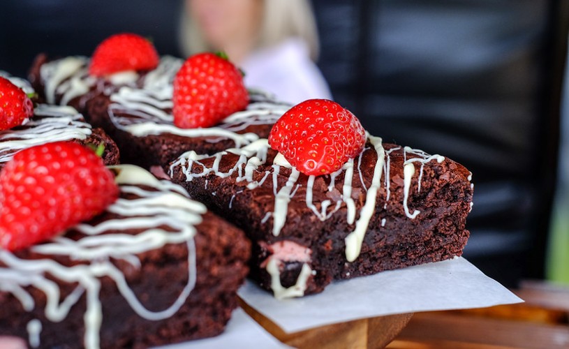 Brownies topped with strawberries and icing at Bradford-on-Avon Food Festival